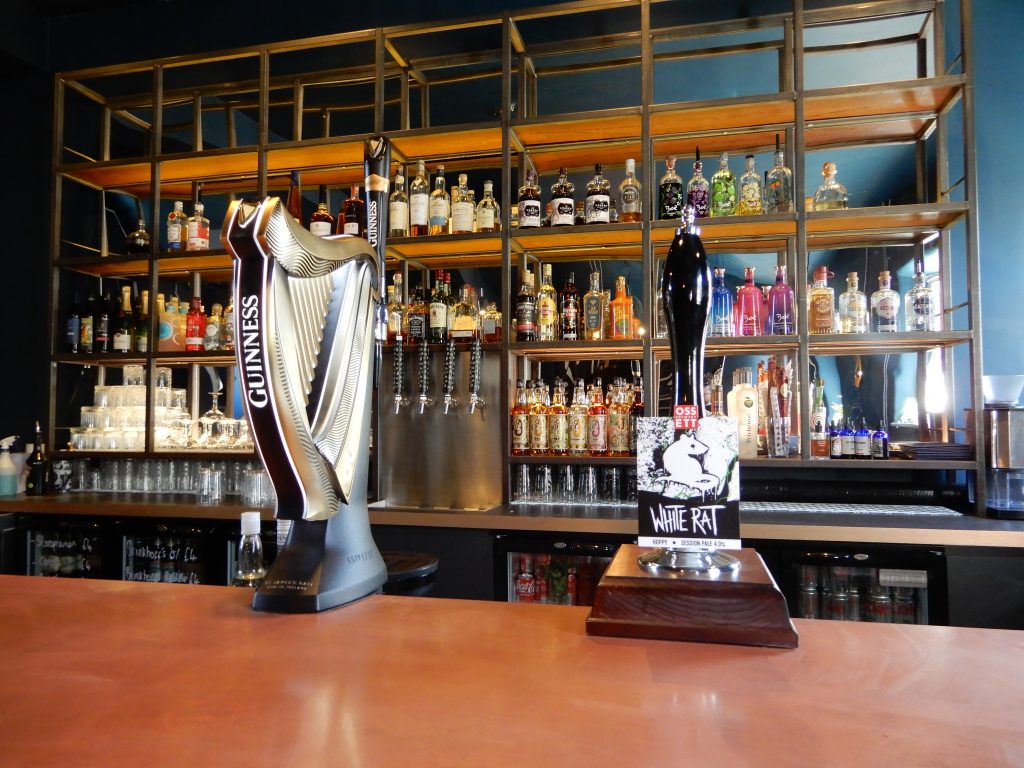 The downstairs bar and tap wall at Perfect Hive.