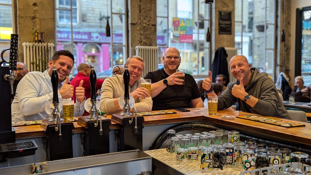 Friends enjoying drinks at the Perfect Hive bar.